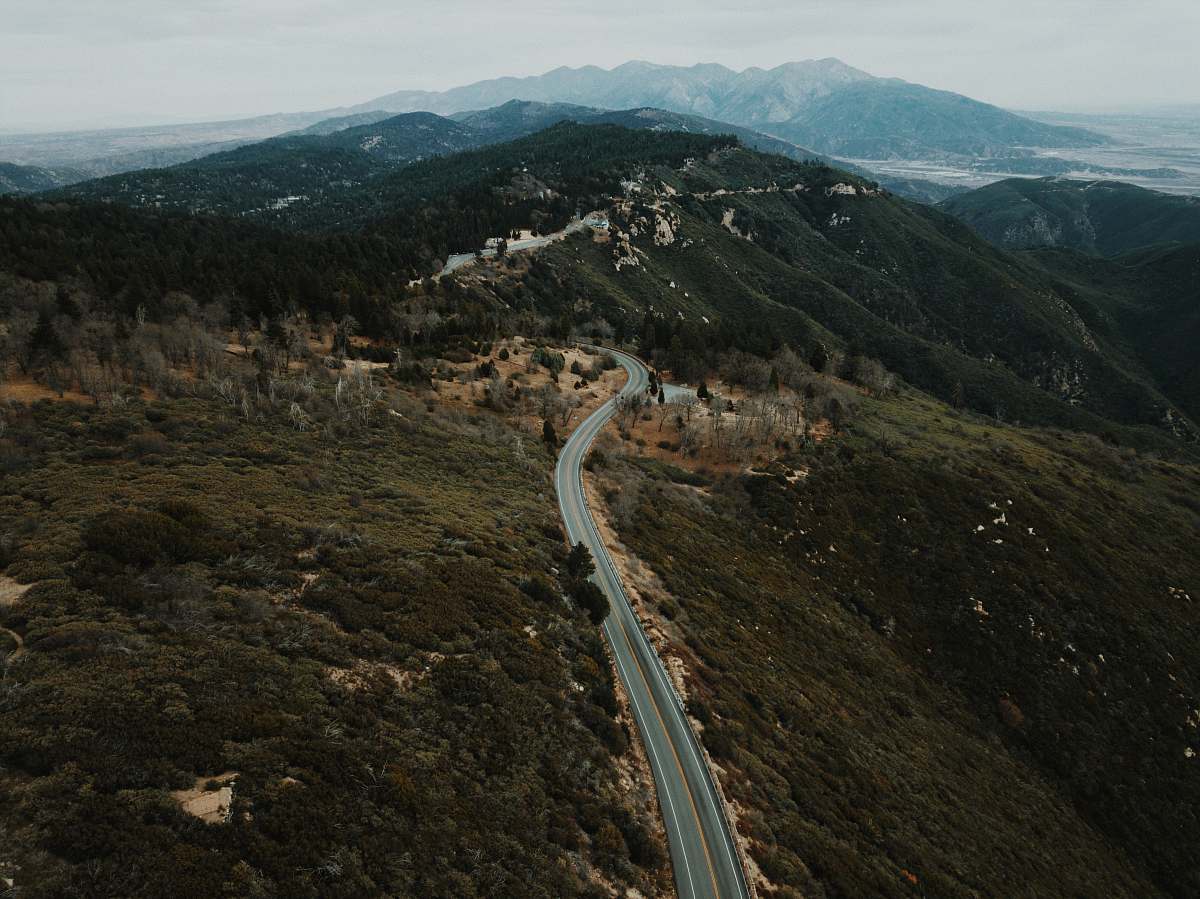 mountain aerial view of road through mountains california